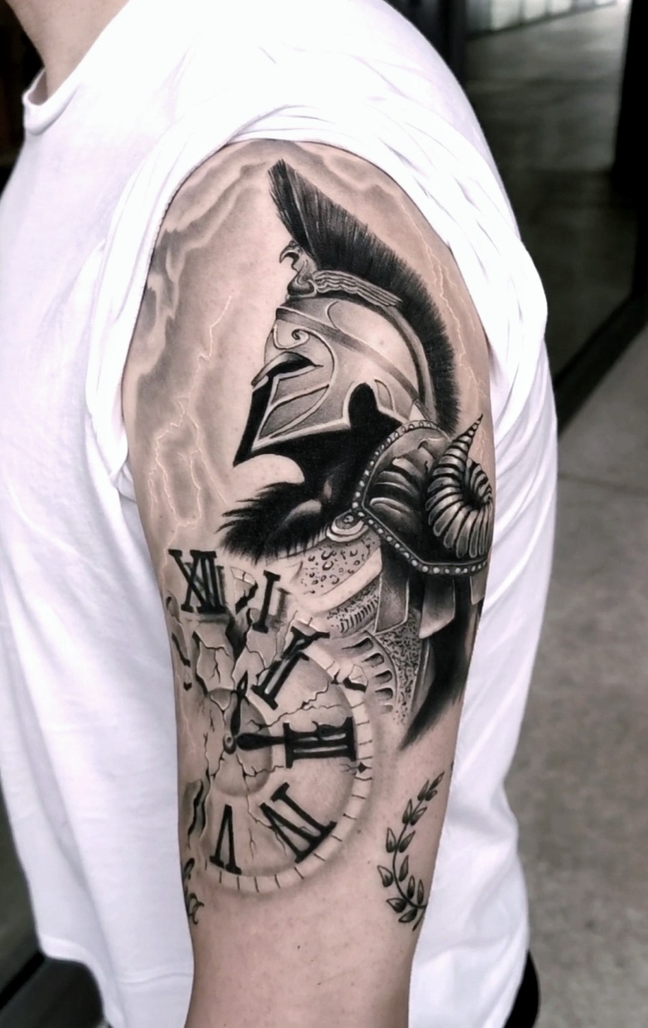Helmet and broken watch on the upper arm